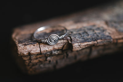 Ring made of one piece of silver wire. Handmade without soldering. Twisted silver ring. Boho style. Sterling silver.