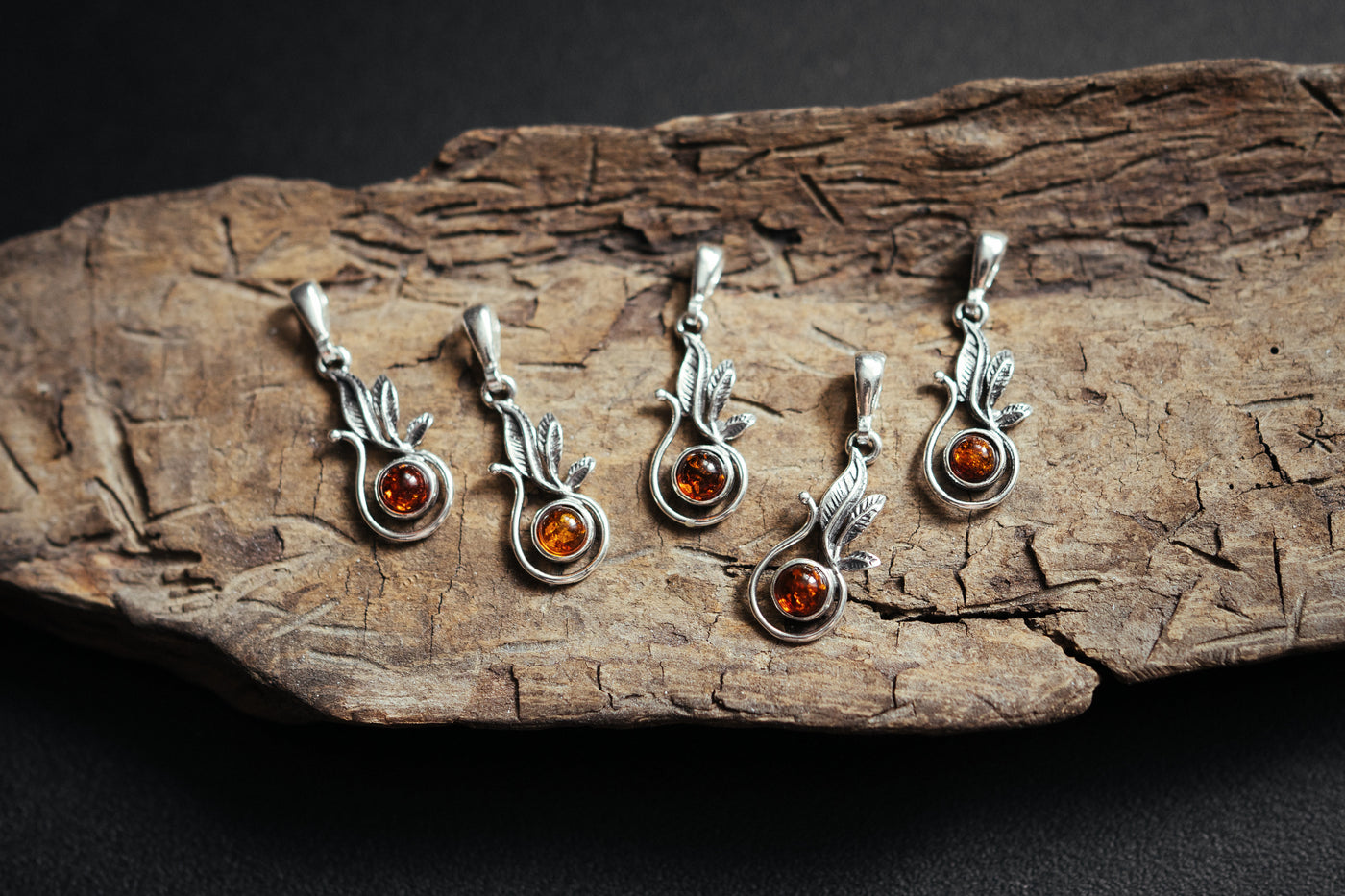 Nurturing Nature - Silver Pendant with Natural Baltic Amber