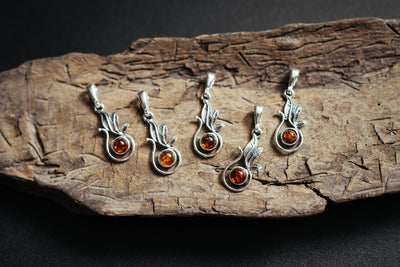 Nurturing Nature - Silver Pendant with Natural Baltic Amber