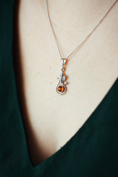 Nurturing Nature - Silver Pendant with Natural Baltic Amber