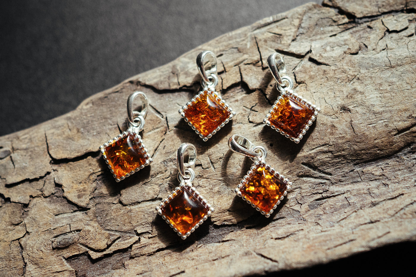 Dazzling Geometry - Silver Rhombus Pendant with Natural Baltic Amber