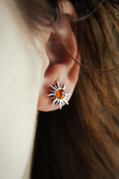 Sun amber stud earrings.