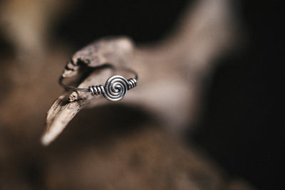 Ring made of one piece of silver wire. Handmade without soldering. Twisted silver ring. Boho style. Sterling silver.