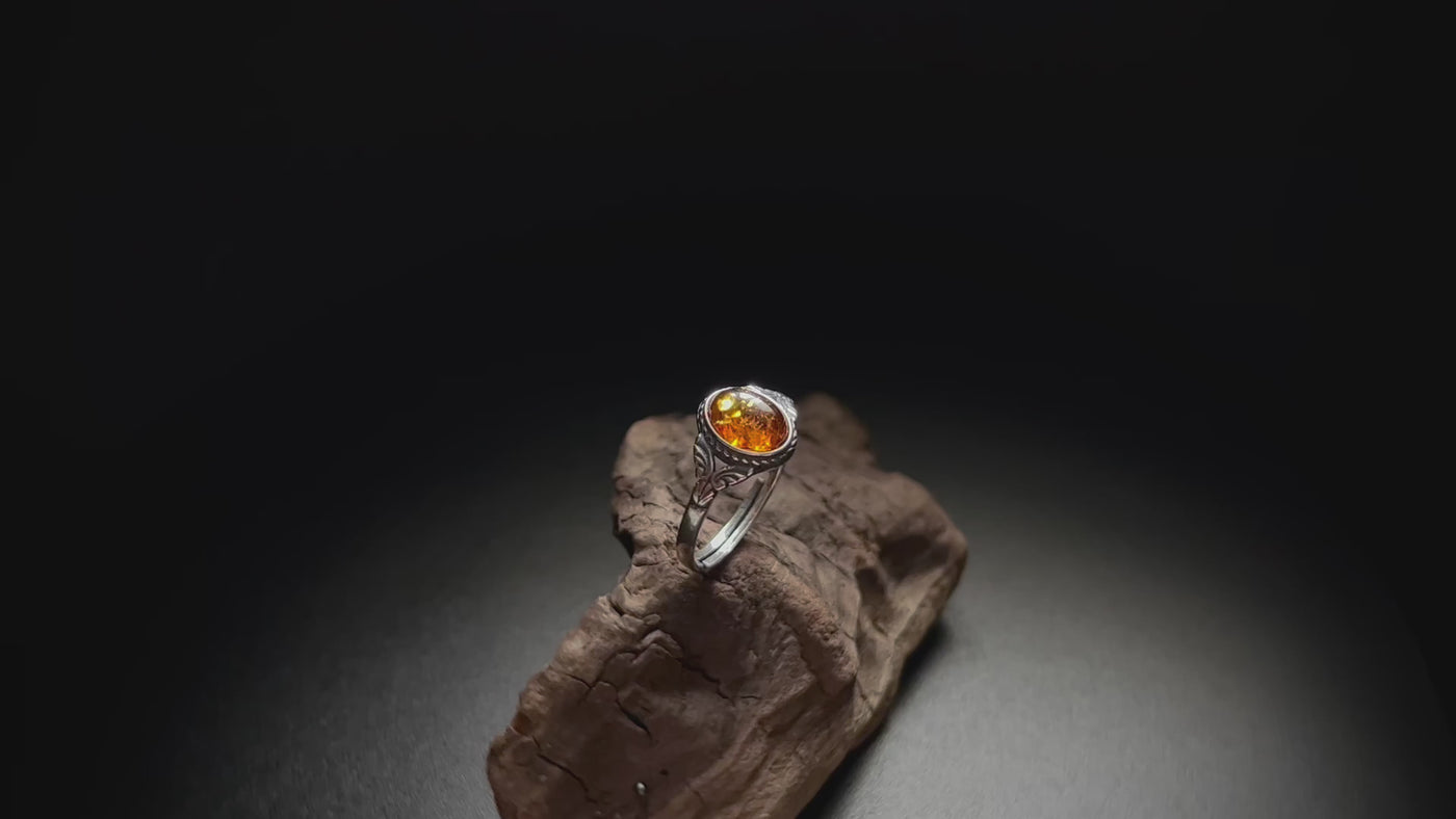 Beautiful amber sterling silver ring. Natural cognac Baltic amber with golden flakes. Unique and exceptional Anniversary gift. Adjustable