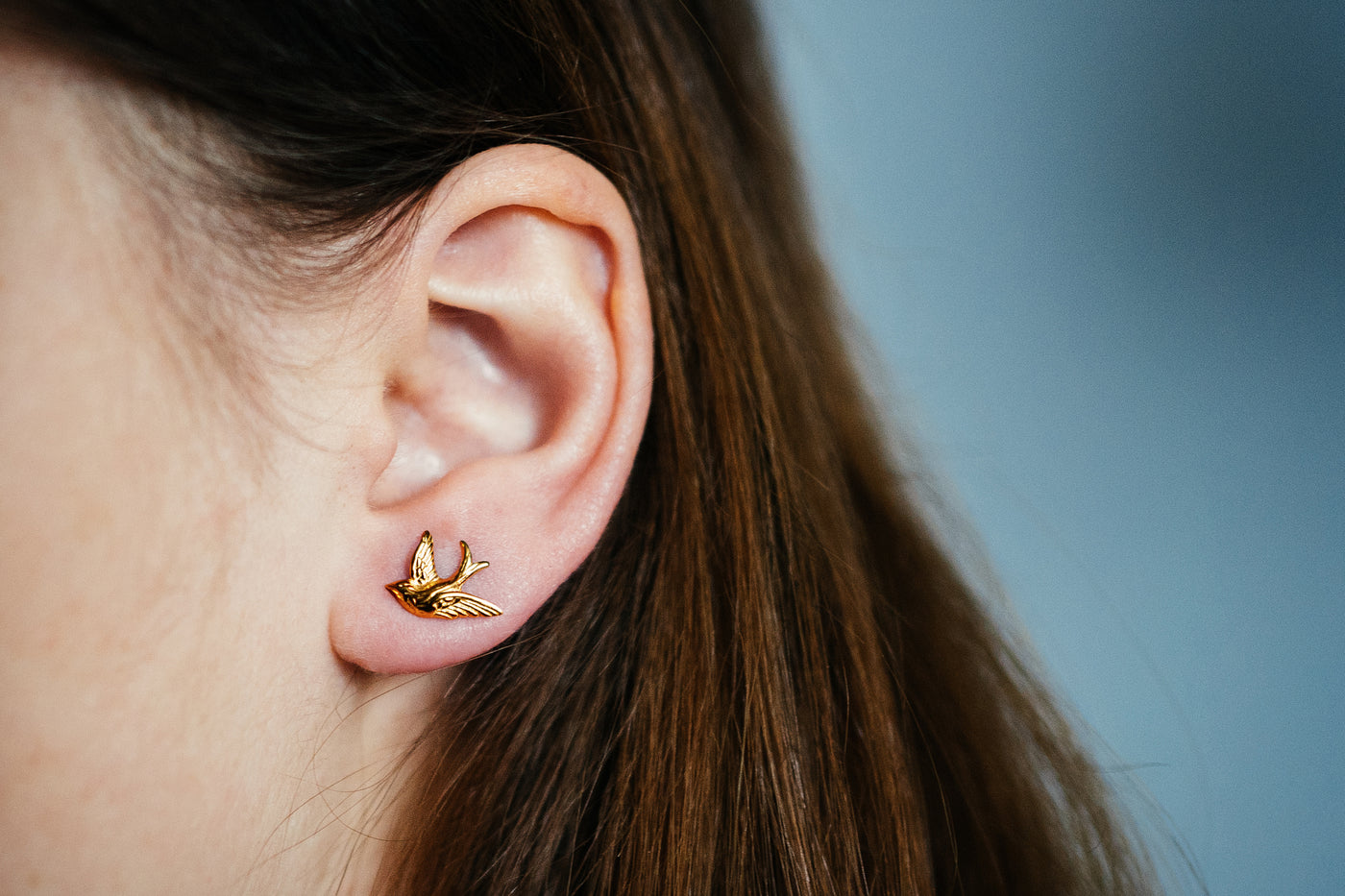 Little cute bird earrings. Golden swallows